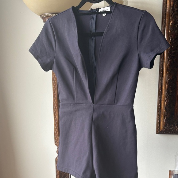 Super down stretchy one piece plunging neckline zippered back romper - Picture 1 of 3